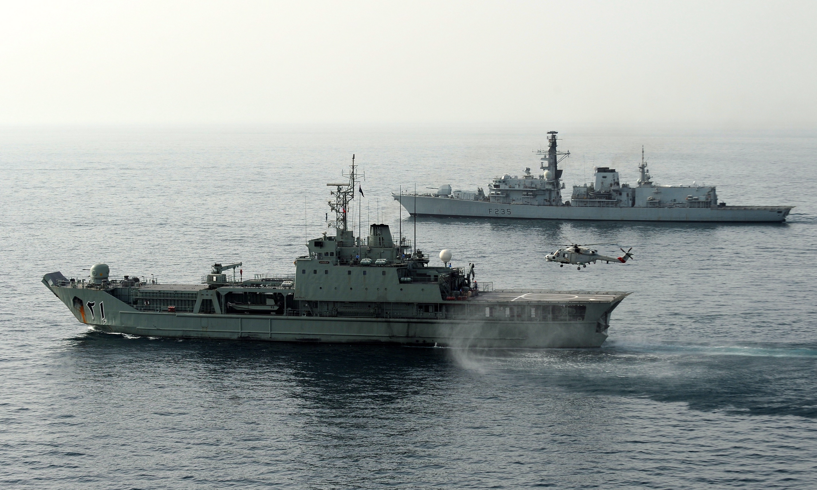 Omani_Naval_Ship_Nasr_al_Bahr_and_HMS_Monmouth_During_Exercise_Khanjar_Ha'ad_near_Oman_MOD_45153355.jpg