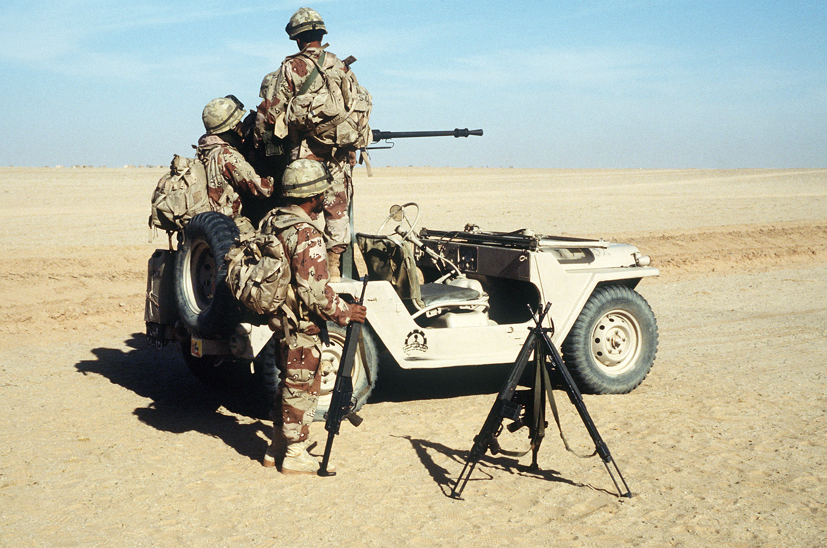 Soldiers_of_the_4th_Brigade%2C_Royal_Saudi_Land_Force_fire_an_M-2_.50-caliber_machine_gun_mounted_on_the_back_of_a_M-151_light_vehicle_during_an_Operation_Desert_Shield_capabilities_d_-_DPLA_-_ab531898e046f0a13cf24f0f8dafb384.jpeg