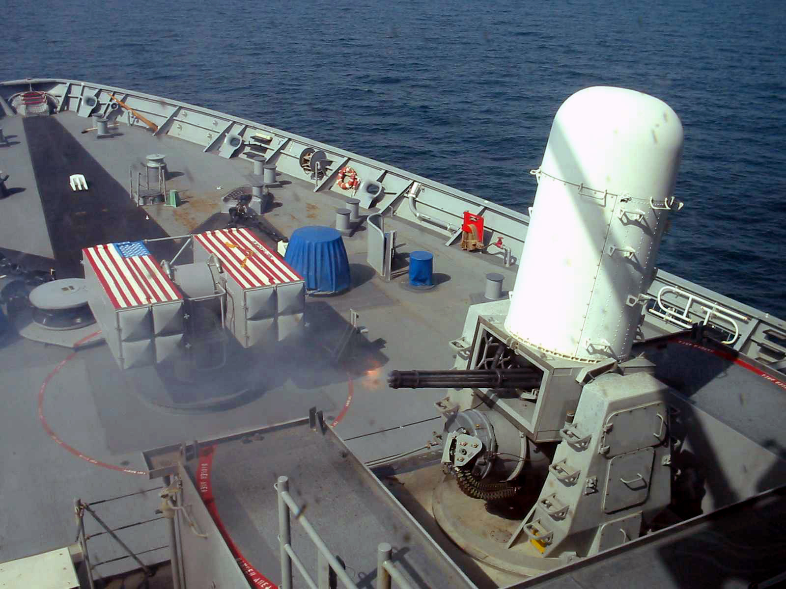 Phalanx_CIWS_PAC_fire_USS_Rainer.jpg