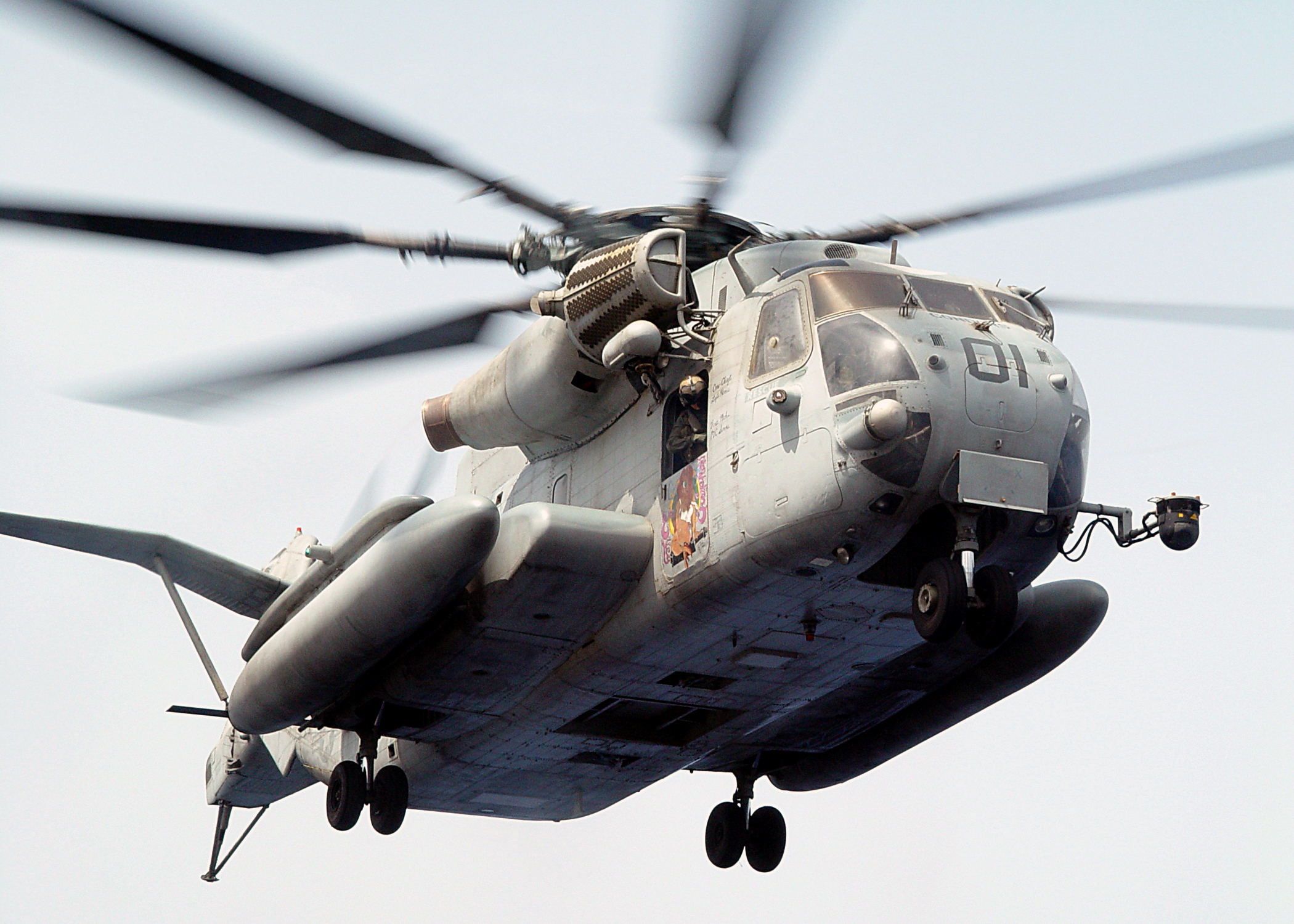 US_Navy_030612-N-2972R-073_A_CH-53E_Super_Stallion_prepares_to_land_on_the_flight_deck_to_transfer_elements_from_the_Second_Marine_Expeditionary_Brigade_%282nd_MEB%29_to_the_amphibious_assault_ship_USS_Bataan_%28LHD_5%29.jpg