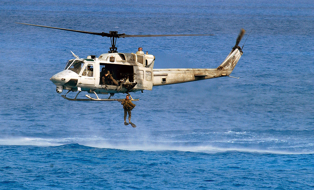 1280px-UH-1N_dropping_Marine_off_Egypt_2001.JPEG