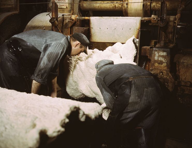 sheet-of-synthetic-rubber-coming-off-the-rolling-mill-at-the-plant-of-goodrich-1941-741x570.jpg